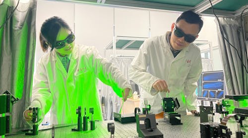 Panpan Yu (left) and Lei Gong in the lab, working on their 3D-SDH project, observe the speckle light field behind a scattering medium. The speckle field helps break the depth-control limit of holographic projection.