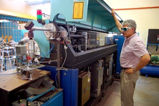 Dr. Jorge Ramos-Grez and the Oerlikon 3.5 kW CO2 used for welding and cladding applications at LATIL in Pontificia Universidad Cat&oacute;lica de Chile.