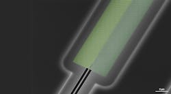 FIGURE 1. A scanning electron microscope image of a valley-Hall topological waveguide. The waveguide is formed at the edge between two photonic topological insulators (bright and dark green) that are created in nanoscale silicon membranes. Light propagating in such topological waveguides has been predicted to be immune to backscattering on structural defects, but it hadn’t been investigated experimentally. FIGURE 1. A scanning electron microscope image of a valley-Hall topological waveguide. The waveguide is formed at the edge between two photonic topological insulators (bright and dark green) that are created in nanoscale silicon membranes. Light propagating in such topological waveguides has been predicted to be immune to backscattering on structural defects, but it hadn’t been investigated experimentally.