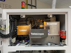 FIGURE 5. Integration of a laser module, beam expander, and scanner inside a commercial powder-bed 3D printer.