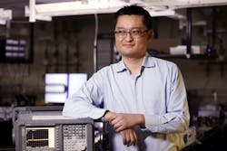 Zheshen Zhang in his lab at the University of Michigan.