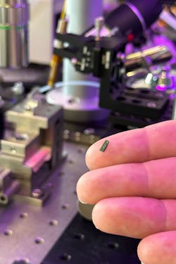 FIGURE 1. An optical isolation system no larger than a grain of rice and measuring less than 400 nm thick incorporates a ring resonator (or two cascaded ones) fabricated on a silicon nitride chip. The chip is integrated into a laser system to narrow its linewidth, reduce noise, and improve efficiency.