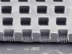 FIGURE 4. In microfluidic devices for pharmaceutical discovery and development applications, the same 248nm excimer can produce micro-wells and tiny vias for sealed electrical connections as in this polycarbonate sample.