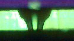 Cross section of an inkjet nozzle hole. Cross section of an inkjet nozzle hole.