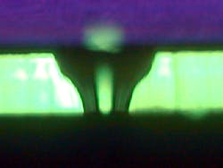 Cross section of an inkjet nozzle hole. Cross section of an inkjet nozzle hole.