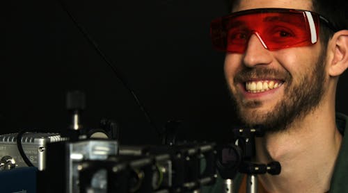 Christian Golla, who did most of the group&rsquo;s experimental work with their tailored nonlinear metasurfaces, in the lab.