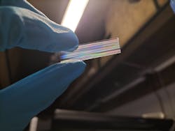 A 4-cm-long sapphire integrated photonics chip. A 4-cm-long sapphire integrated photonics chip.