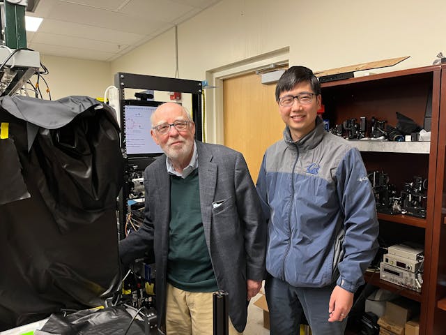 Scientists Graham Fleming (left) and Quanwei Li in the lab with their quantum light spectroscopy setup.