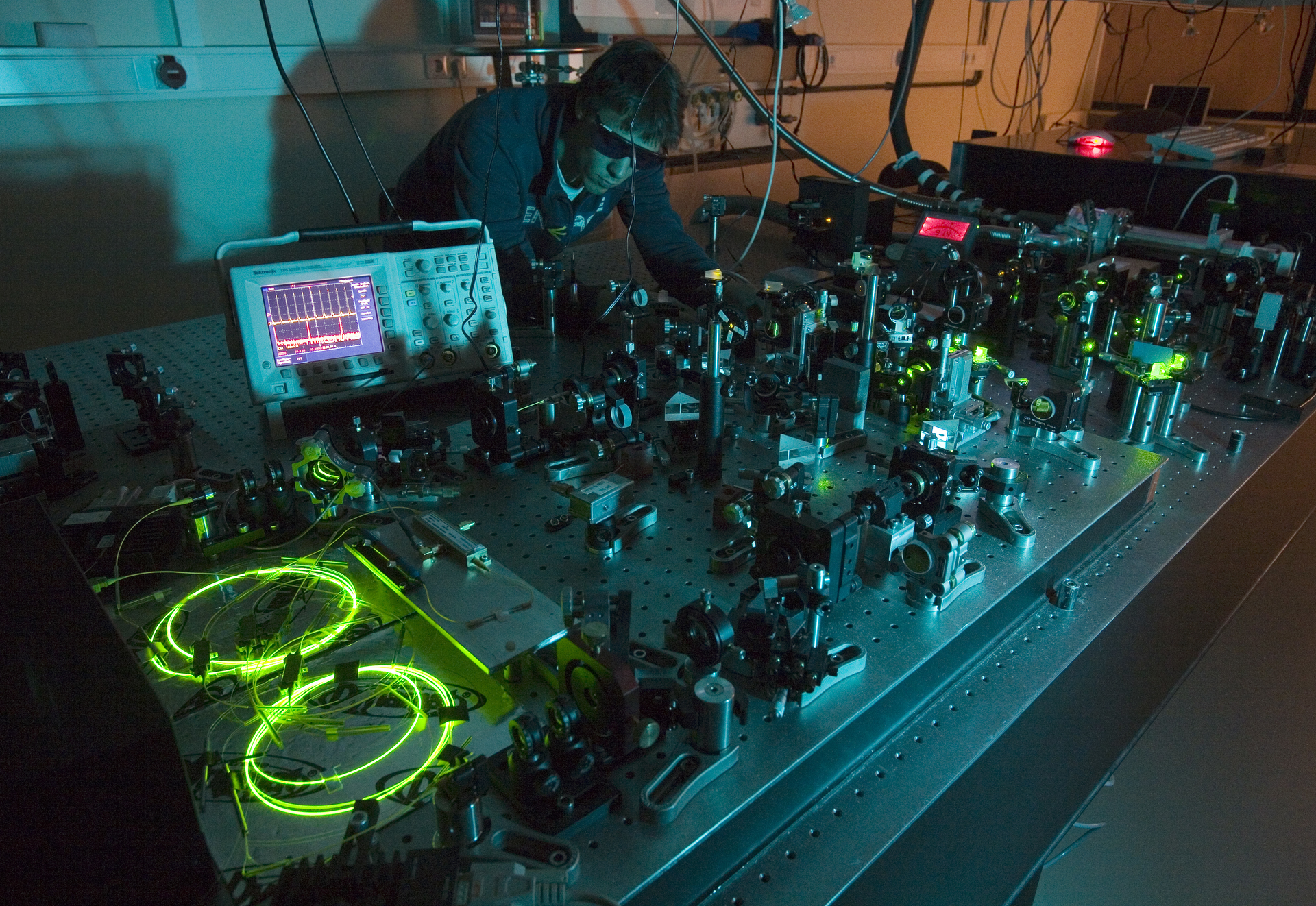 FIGURE 1. The group&rsquo;s first Er:fiber laser system, designed for two-color femtosecond experiments on single-electron systems.