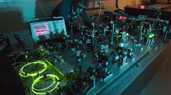 FIGURE 1. The group’s first Er:fiber laser system, designed for two-color femtosecond experiments on single-electron systems.