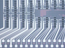 FIGURE 1. Microscope image of a photonic chip hosting the programmable processor used for the photonic neural network.