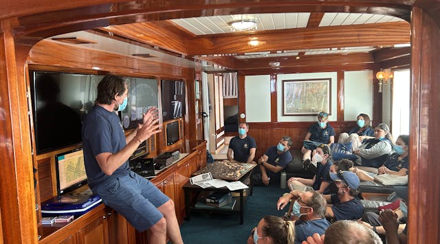 FIGURE 1. InVADER project leader Pablo Sobron explains the system&rsquo;s mission to the team of scientists onboard E/V Nautilus before ocean deployment.