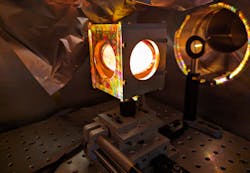 White light from a laser-generated air plasma is incident on the pointing screen of the TAU Systems electron spectrometer. White light from a laser-generated air plasma is incident on the pointing screen of the TAU Systems electron spectrometer.