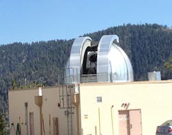 FIGURE 3. A high-power NIR laser transmitter at NASA Jet Propulsion Laboratory&rsquo;s Table Mountain facility will transmit low-rate data to the transceiver in space.