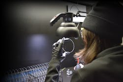 Madison Oxford cleans a series of optical windows. Madison Oxford cleans a series of optical windows.