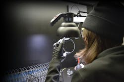 Madison Oxford cleans a series of optical windows. Madison Oxford cleans a series of optical windows.