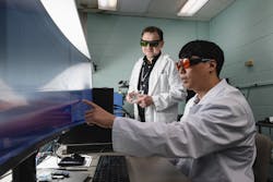 FIGURE 1. Purdue researcher Bartek Rajwa (left) and Purdue postdoctoral fellow Sungho Shin review data produced with a portable LIBS spectroscopy device. FIGURE 1. Purdue researcher Bartek Rajwa (left) and Purdue postdoctoral fellow Sungho Shin review data produced with a portable LIBS spectroscopy device.