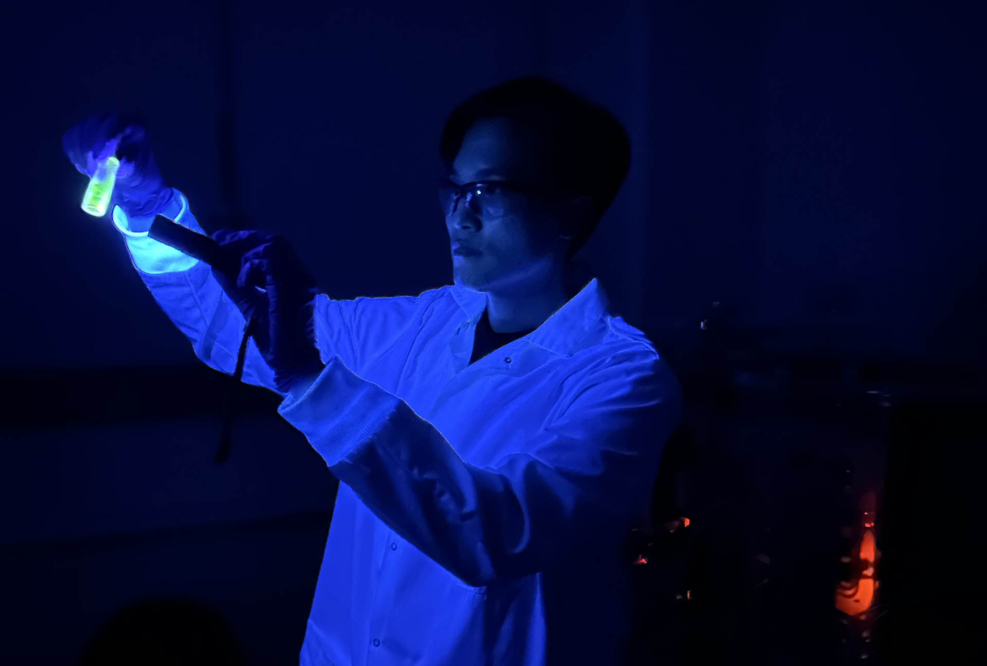 Jee Yung Park looks at some of the perovskite crystals in the lab.