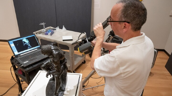 An NVision engineer prepares to conduct a 3D scan of 'The Freedman,' a statue created in 1863.