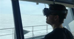 FIGURE 5. Researcher Jon Fauske experiments with AR navigation using the HoloLens 2 with sun screen during bright light conditions in the Arctic. FIGURE 5. Researcher Jon Fauske experiments with AR navigation using the HoloLens 2 with sun screen during bright light conditions in the Arctic.