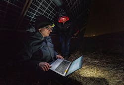National Renewable Energy Laboratory (NREL) researchers Tim Silverman and Nicole Luna look over data generated by PLatypus, which was connected to a photovoltaics system on the Flatirons campus. National Renewable Energy Laboratory (NREL) researchers Tim Silverman and Nicole Luna look over data generated by PLatypus, which was connected to a photovoltaics system on the Flatirons campus.