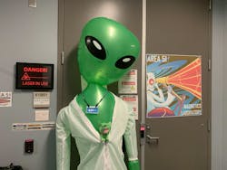 Alistair the Alien guards the lab entrance; artwork courtesy of Peter Johnsen.