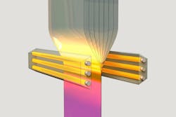FIGURE 1. A monolithic polymer stack is drawn in one direction through a heating zone to form the filters. FIGURE 1. A monolithic polymer stack is drawn in one direction through a heating zone to form the filters.