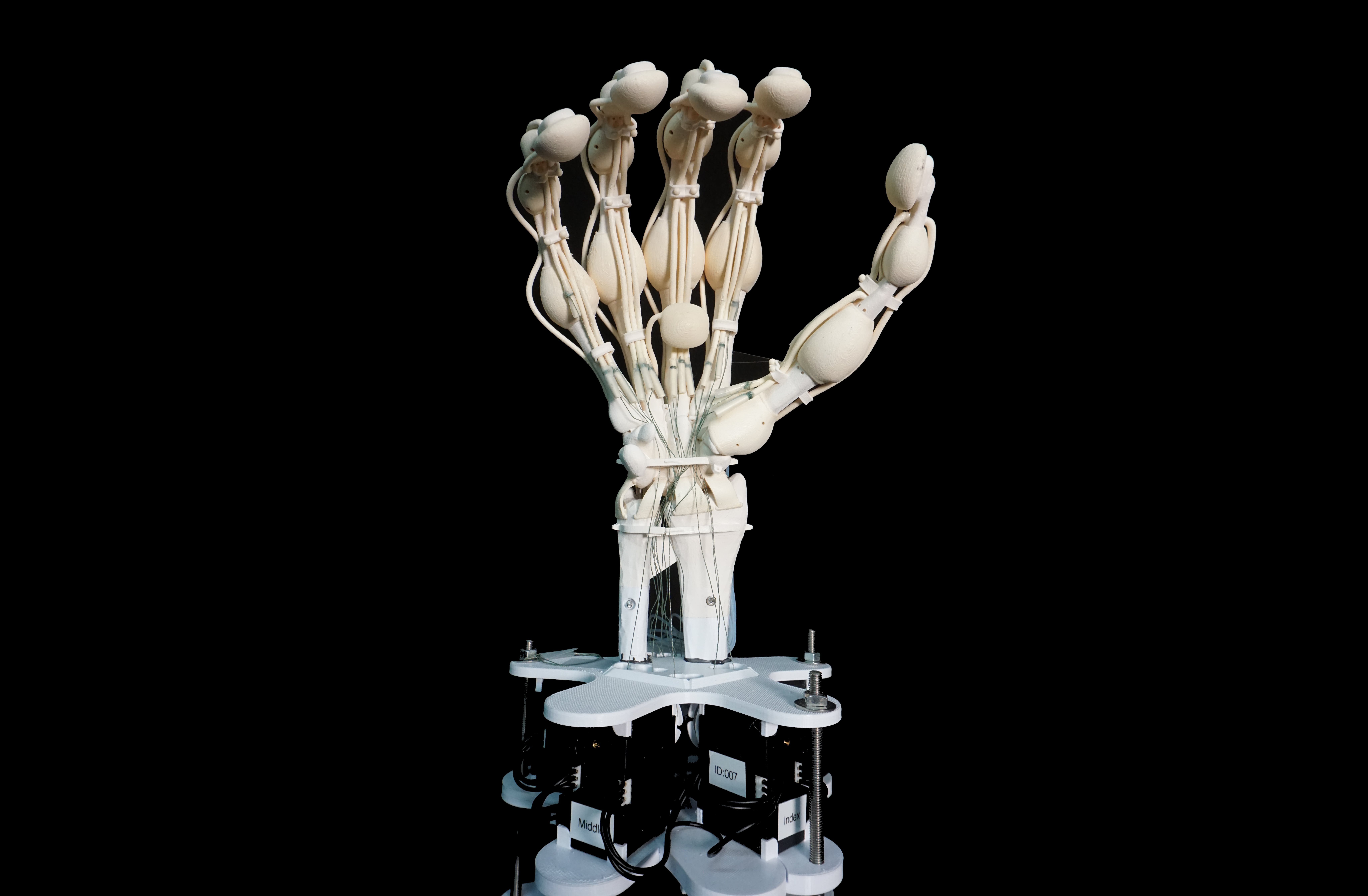 FIGURE 1. Researchers have 3D printed a robotic hand&mdash;complete with bones, ligaments, and tendons&mdash;out of varying rigid and elastic polymers, all in a single and more efficient process, using a unique laser scanning technique.