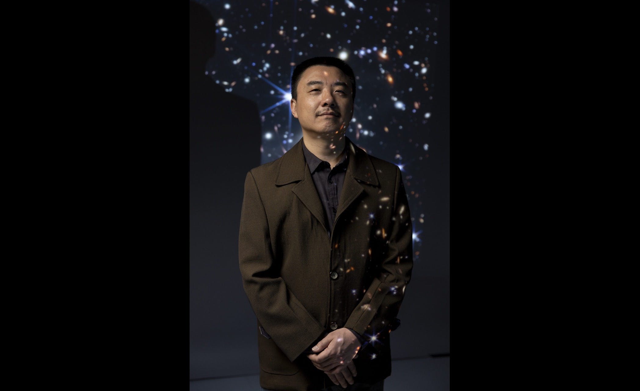 Haojing Yan, an associate professor of physics and astronomy, is using the Webb Space Telescope&rsquo;s imagery and gravitational lensing to hunt for dark matter.