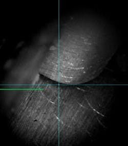 FIGURE 1. An example of inadequate clamping, leaving a gap under the part to be welded. FIGURE 1. An example of inadequate clamping, leaving a gap under the part to be welded.