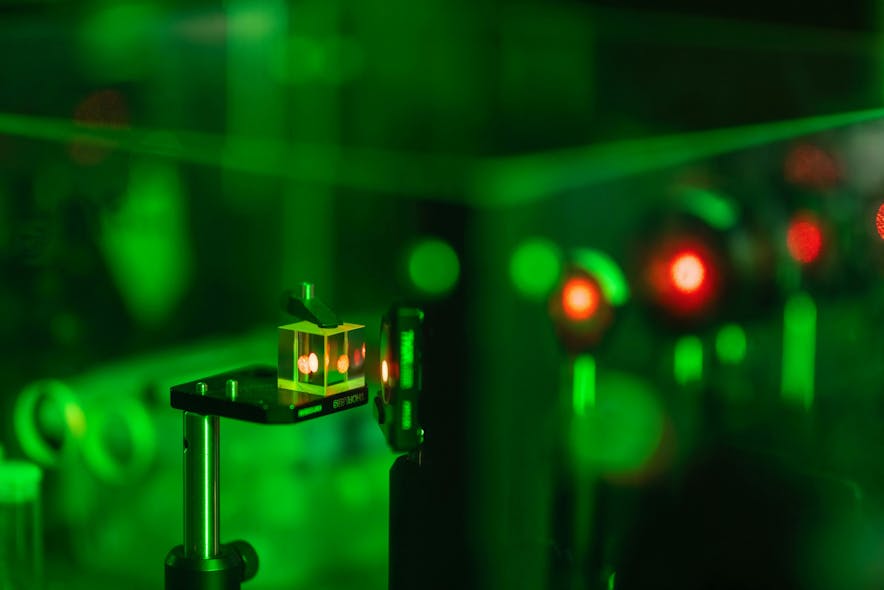 FIGURE 1. Close-up of a linear optical element, a beamsplitter&mdash;the traditional tool for teleportation.