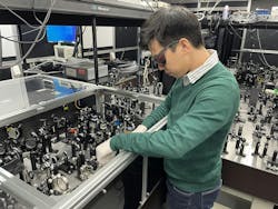 FIGURE 1. Keitaro Shimada working on an ultrafast imaging system using the spectrum shuttle. FIGURE 1. Keitaro Shimada working on an ultrafast imaging system using the spectrum shuttle.