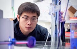 Xueji Wang in the lab. Xueji Wang in the lab.