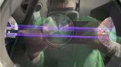 The beam path in the pulse compression chamber, visualized by an additional gas medium. The beam path in the pulse compression chamber, visualized by an additional gas medium.