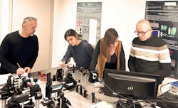 FIGURE 2. The team (left to right: Gianluigi Zito, Aida Saifelinezhad, Silvia Romano, and Bruno Miranda) in the lab with their setup. FIGURE 2. The team (left to right: Gianluigi Zito, Aida Saifelinezhad, Silvia Romano, and Bruno Miranda) in the lab with their setup.