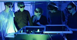 Birgitta Bernhardt (second from right) and her team with their broadband UV dual-comb spectrometer. Birgitta Bernhardt (second from right) and her team with their broadband UV dual-comb spectrometer.