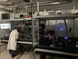 Optical tables with the amplified laser system and the optical parametric amplifier where the experiment was performed. Optical tables with the amplified laser system and the optical parametric amplifier where the experiment was performed.