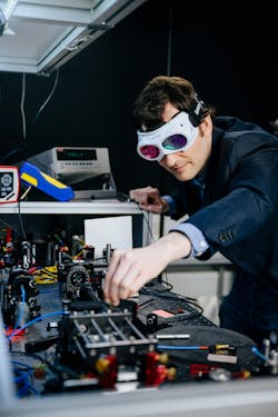 Tim Bartley working in the lab. Tim Bartley working in the lab.