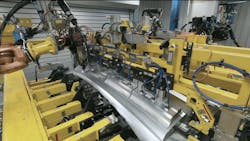 FIGURE 3. The laser brazing process is fully automated; the operator can follow it on a monitor, as a surveillance camera is installed inside the laser cell. At the same time, the weld is tracked by the camera inside the laser optics and all data is connected to this specific car. FIGURE 3. The laser brazing process is fully automated; the operator can follow it on a monitor, as a surveillance camera is installed inside the laser cell. At the same time, the weld is tracked by the camera inside the laser optics and all data is connected to this specific car.