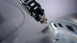 FIGURE 1. Adaptive laser optics follow the 3D contour. Its camera sends live images to a neural network, which detects defects from a laser brazing process in real time.