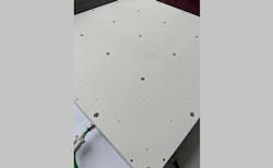 FIGURE 1. Medium-size (600 × 600-mm) PTFE vacuum chuck. FIGURE 1. Medium-size (600 × 600-mm) PTFE vacuum chuck.