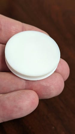 FIGURE 2. Corner puck for use with aluminum vacuum chucks (center at substrate corners). FIGURE 2. Corner puck for use with aluminum vacuum chucks (center at substrate corners).