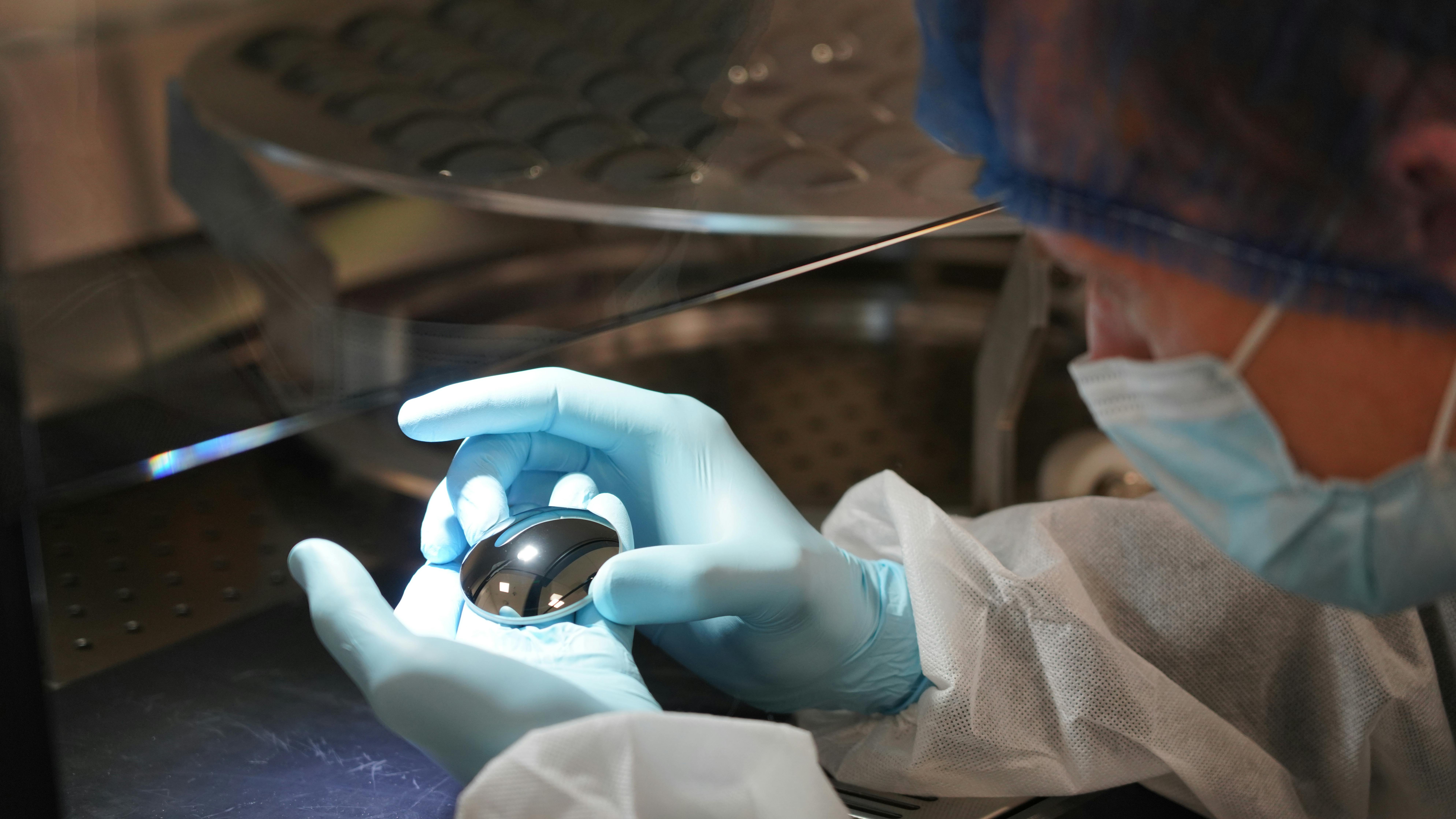 Lens inspection in LightPath Technologies' Orlando facility.