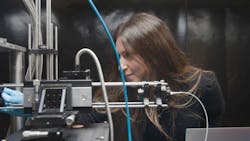 Ludovica Guarneri working on the setup for their lens. Ludovica Guarneri working on the setup for their lens.