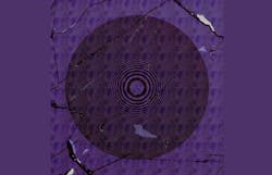 A microscope image of the thinnest lens in the world. A microscope image of the thinnest lens in the world.