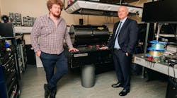 Dr. Ross Donaldson and Professor Gerald Buller pictured with equipment that will be used in the new optical ground station. Dr. Ross Donaldson and Professor Gerald Buller pictured with equipment that will be used in the new optical ground station.