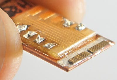 A thumb (and finger as well) dwarf a terahertz-emitting quantum-cascade laser that puts out a peak power of almost a watt.