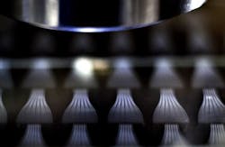 Wafer-scale fabrication of fiber fan-out. Wafer-scale fabrication of fiber fan-out.