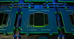 FIGURE 2. A multichip package with four TeraPHY optical I/O chiplets and a customer’s ASIC. FIGURE 2. A multichip package with four TeraPHY optical I/O chiplets and a customer’s ASIC.