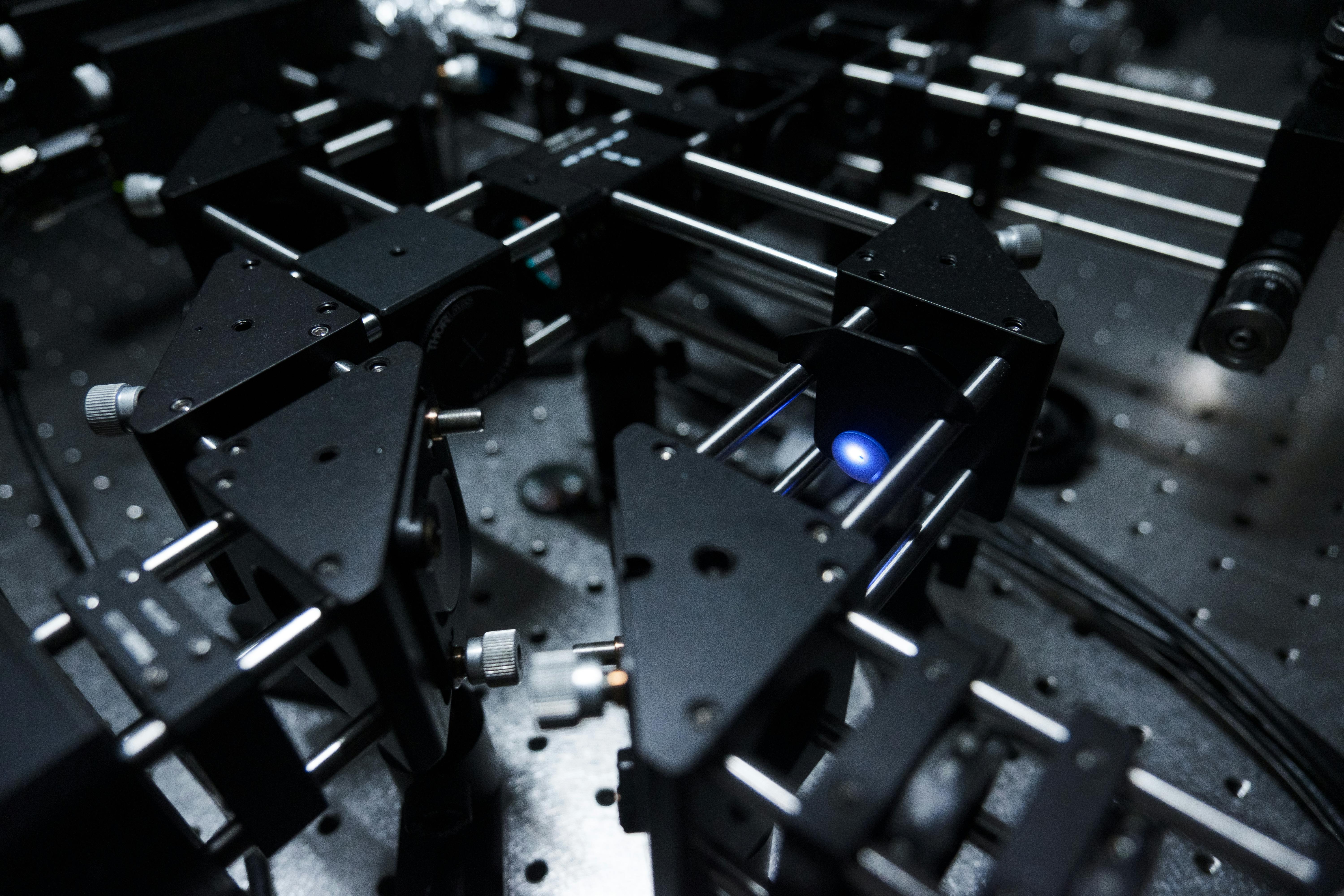 A closeup of the blue laser setup for generating entangled photon pairs in NTU Singapore&rsquo;s experiments.